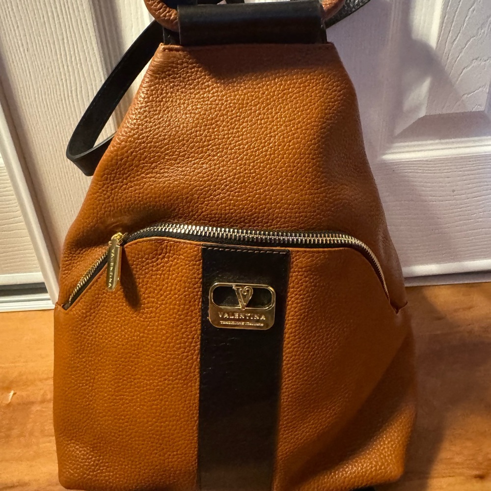 Valentina Tan and Black Leather Backpack